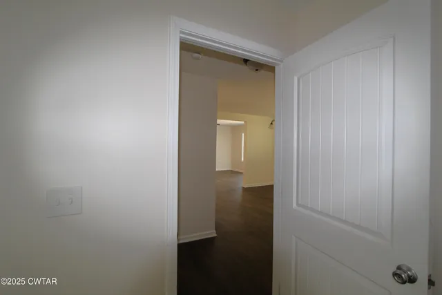 a bathroom with a shower and a sink