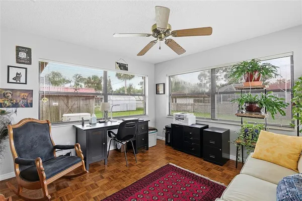 a view of a dining room with furniture window and outside view