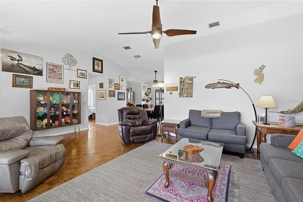 a living room with furniture and a couch
