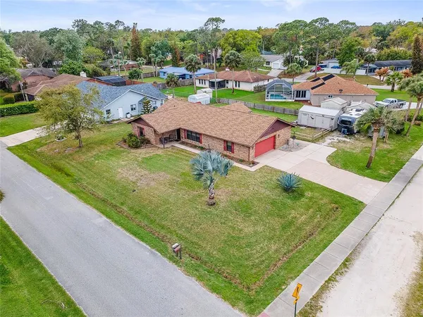 a view of a city with lawn chairs