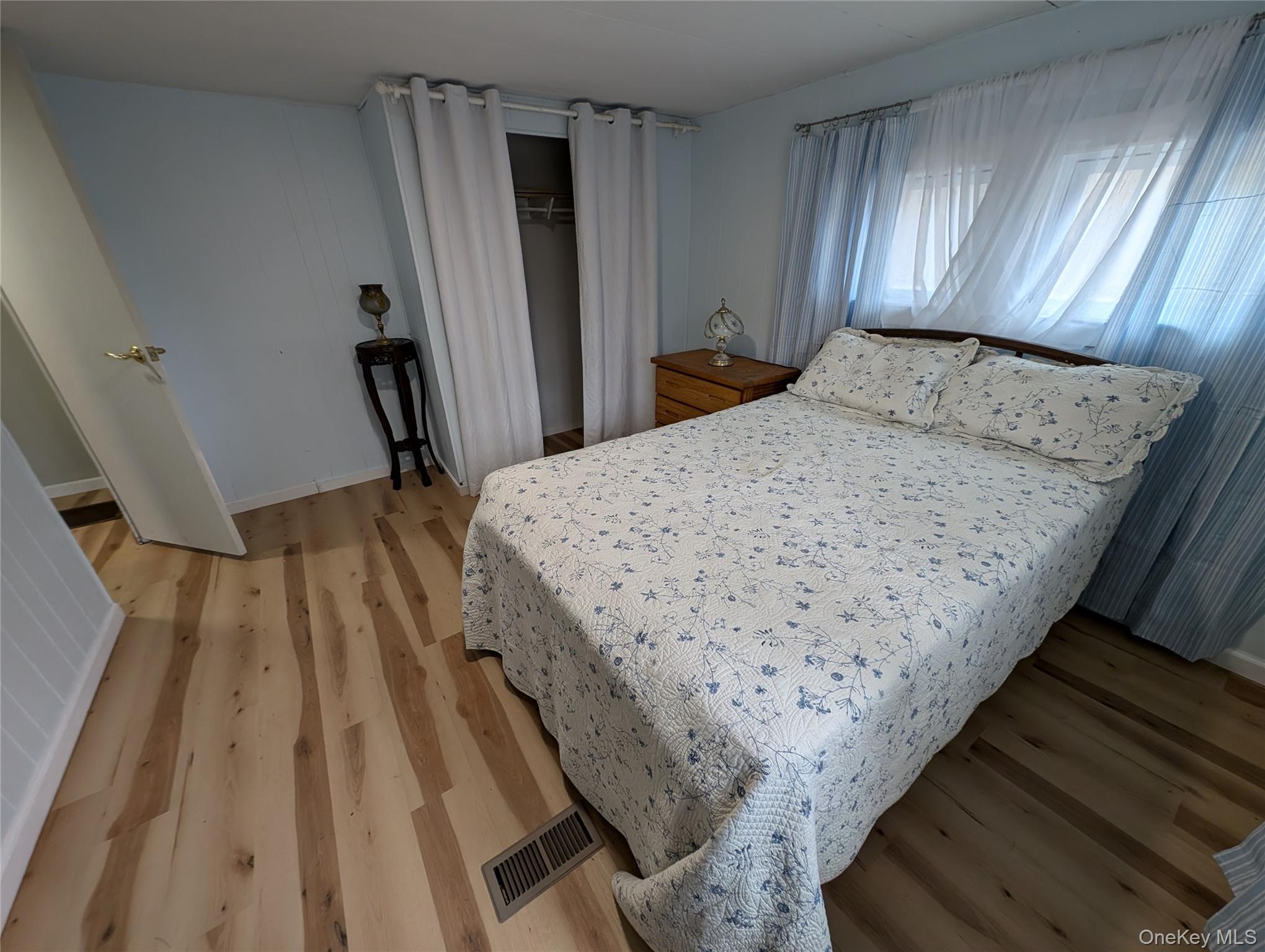 549 Hearts Content Road Cairo, NY 12473 - Photo 16 of 27 a bed sitting in a bedroom next to a window