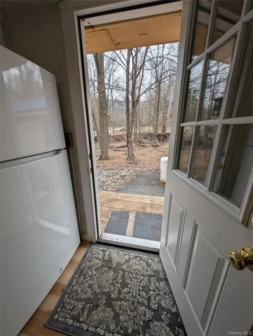 a view of a back yard of the house