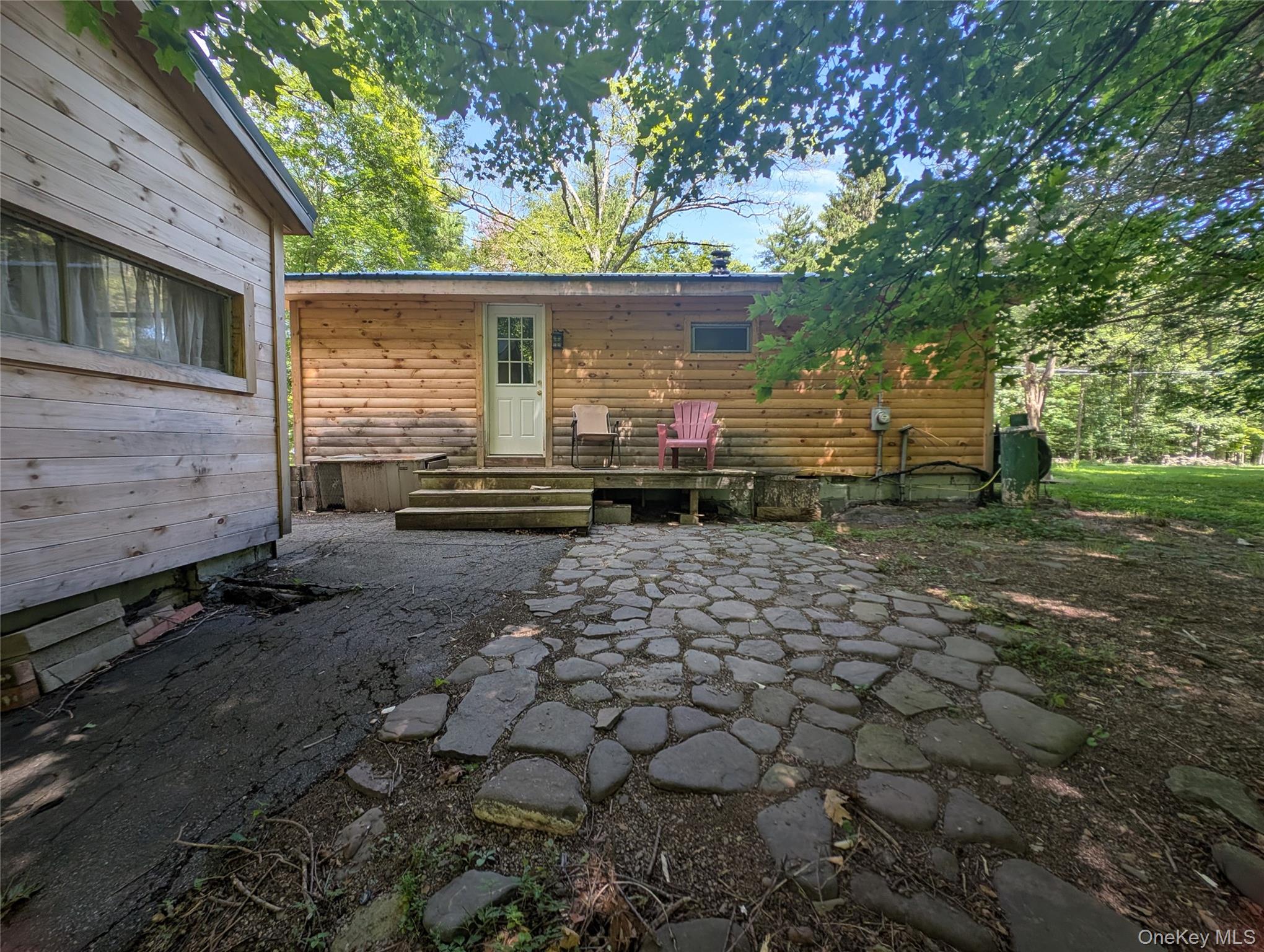 549 Hearts Content Road Cairo, NY 12473 - Photo 20 of 27 a front view of a house with a yard