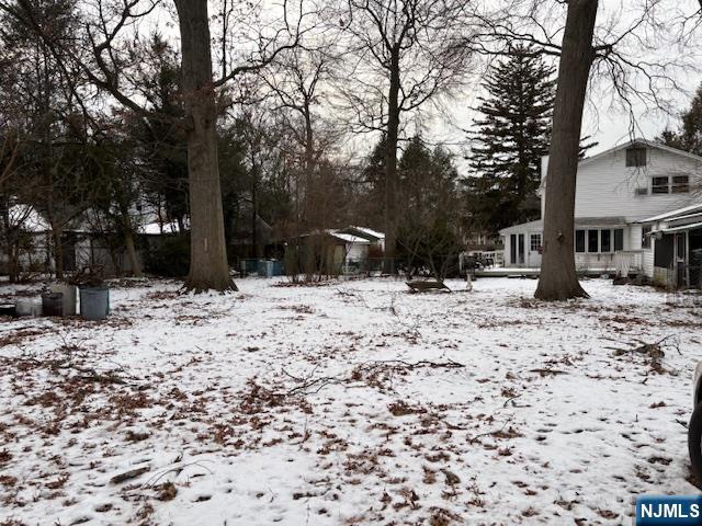 496 Cedar Lane Paramus, NJ 07652 - Photo 5 of 6 a view of snow covered with snow in front of house