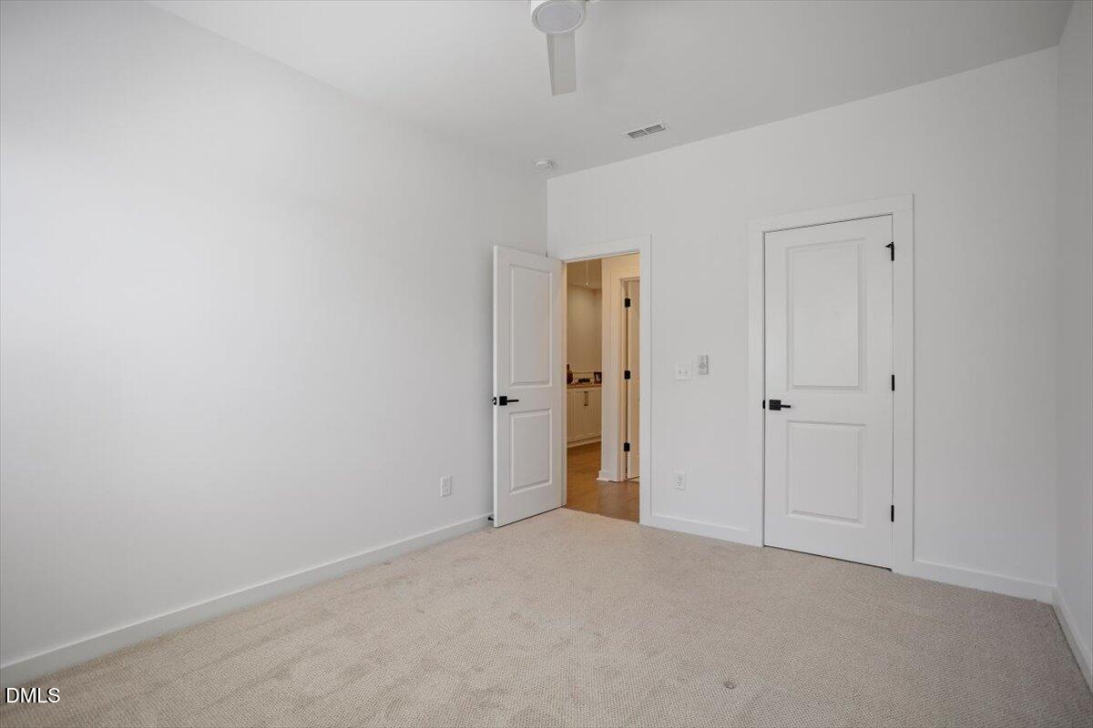 6419 Tanner Oak Lane Raleigh, NC 27613 - Photo 34 of 39 a view of an empty room