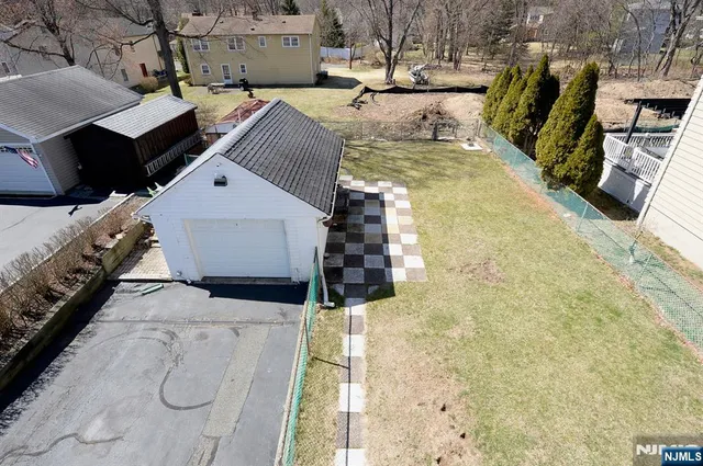 a view of swimming pool with seating space