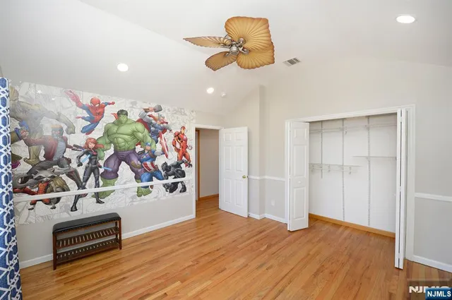 a view of a livingroom with wooden floor
