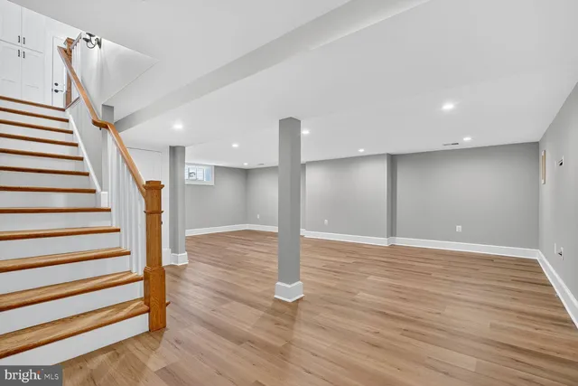 a view of entryway with wooden floor
