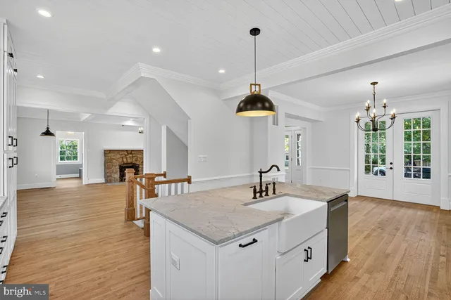 a bathroom with a sink double vanity and a mirror