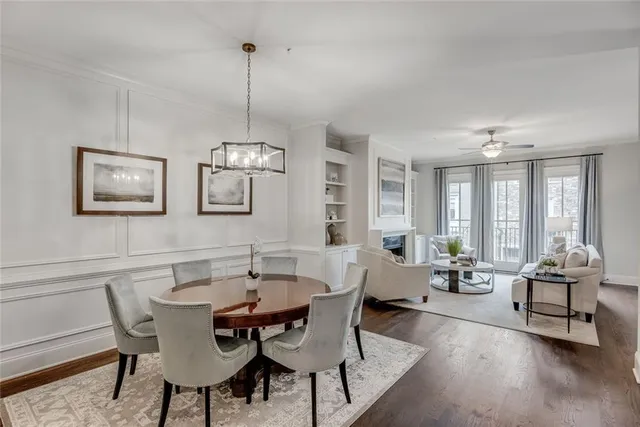 a view of entryway with a window and wooden floor