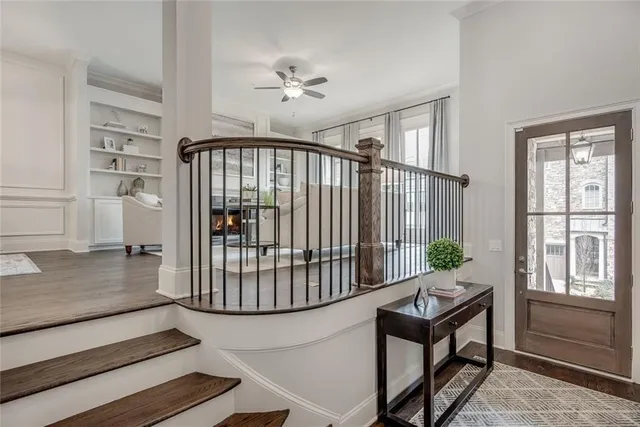 a bedroom with a bed and a table in it