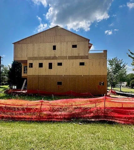 a view of an empty room with a balcony