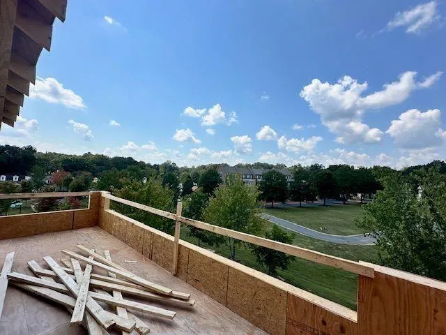 a view of yard with swimming pool and green space