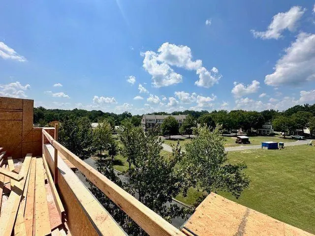 a view of an empty room with a balcony