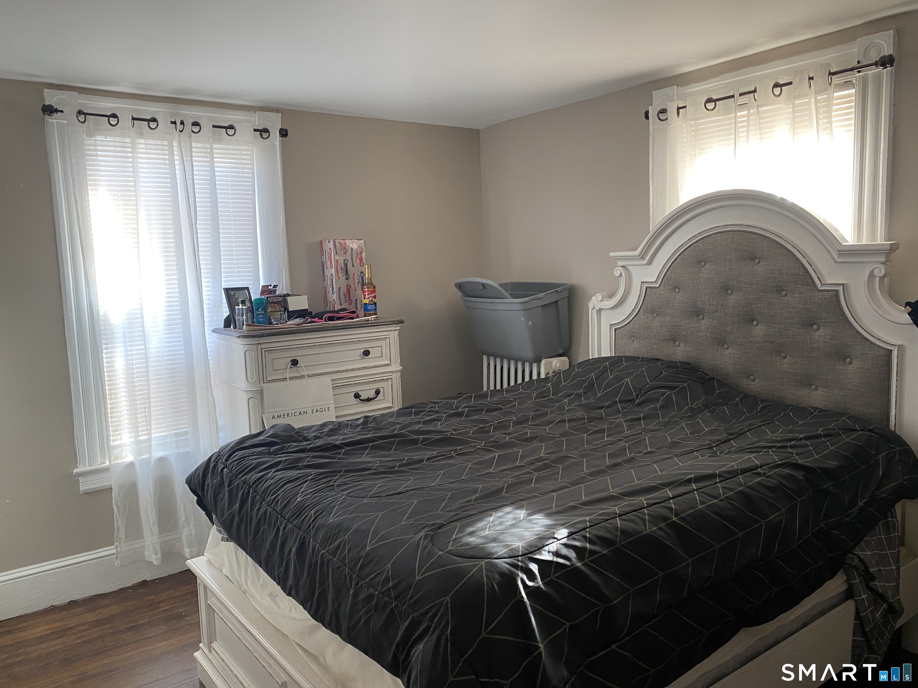 47 Wilson Avenue Windsor, CT 06095 - Photo 14 of 20 a bedroom with a bed and a window