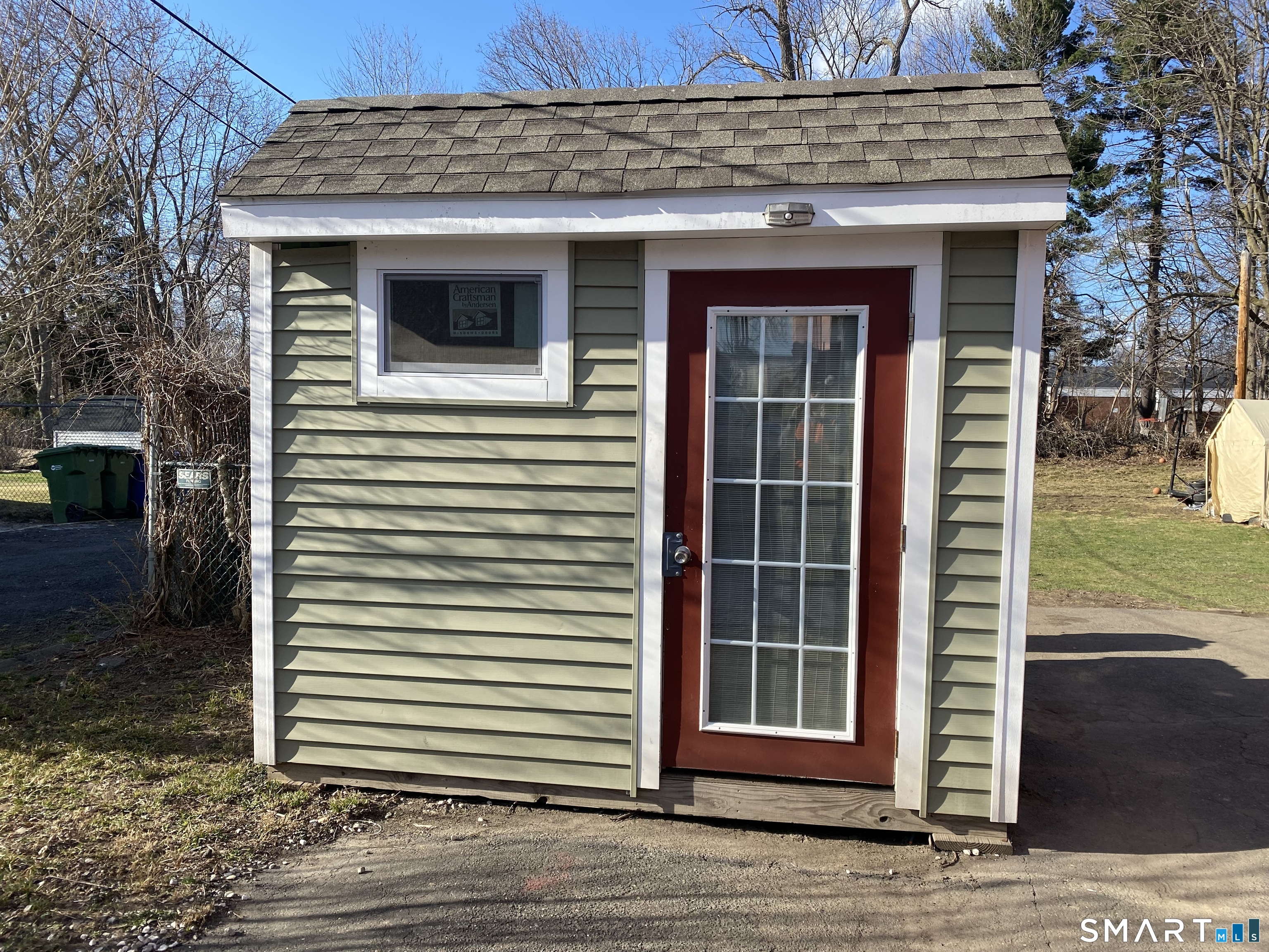 47 Wilson Avenue Windsor, CT 06095 - Photo 4 of 20 a view of a house with wooden door and a window
