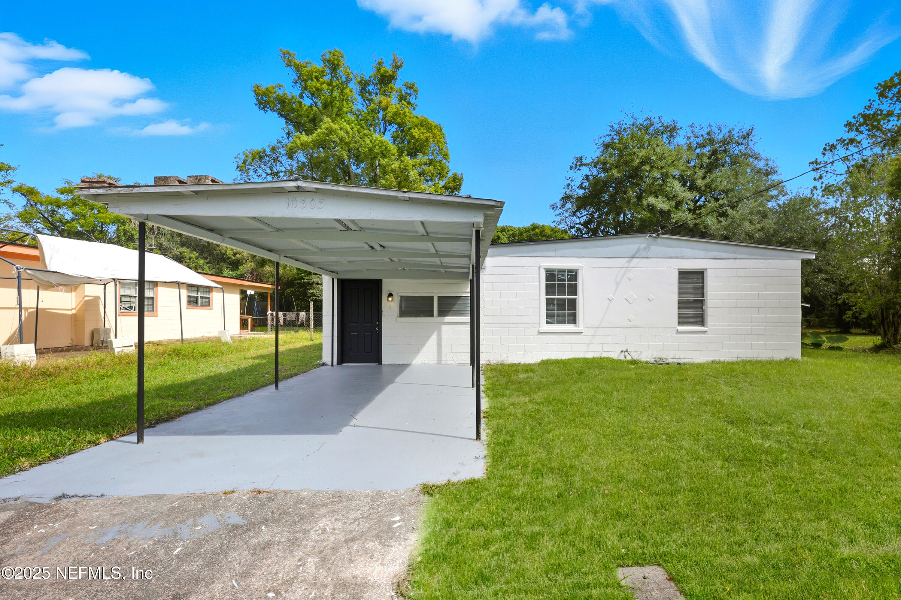 a view of a house with a garden