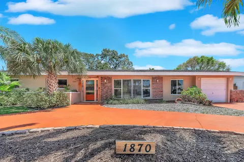 front view of a house with a patio