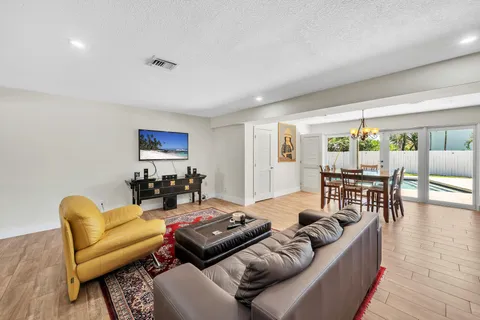 a view of a backyard with a sitting area and furniture