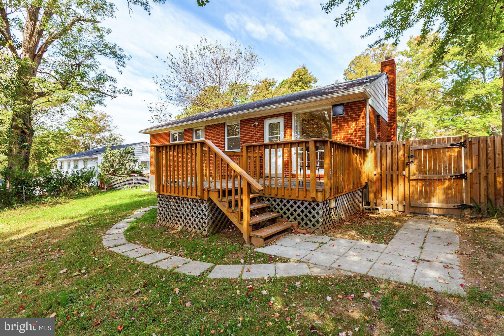 3926 Joliet Street Silver Spring, MD 20906 - Photo 25 of 30 Stairs from Deck Lead to Convenient Pavers