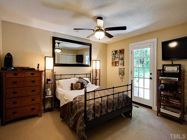 3623 Swann Street Raleigh, NC 27612 - Photo 6 of 22 Master bedroom has a nice french door witth access to rear patio and outdoor spa...