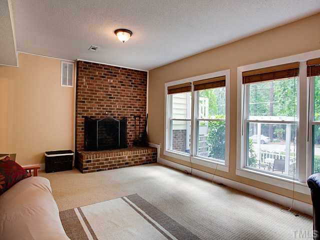 3623 Swann Street Raleigh, NC 27612 - Photo 10 of 22 More room to spread out, all new energy efficient double hung windows and 2nd wood burning fireplace!