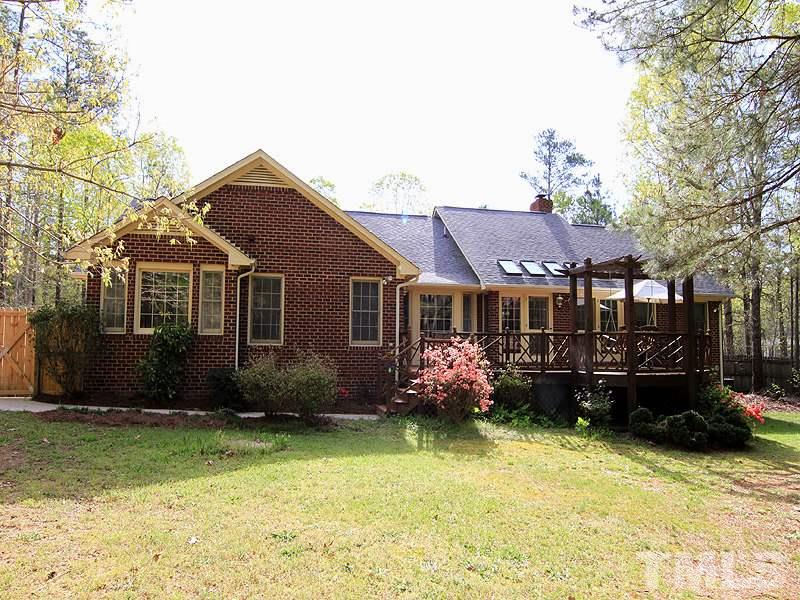 4117 Lassiter Road Wake Forest, NC 27587 - Photo 17 of 22 This well built home is all four sides brick and nestled on over two and a half acres.