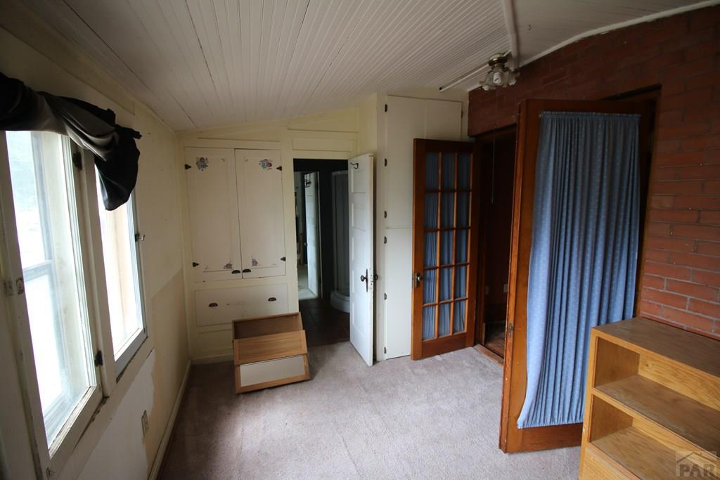 604 South Main Street Fowler, CO 81039 - Photo 11 of 38 a view of room with furniture and a window