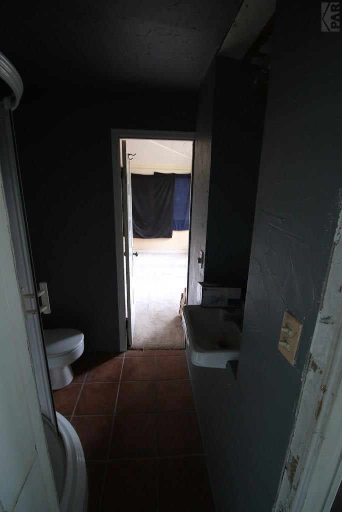 604 South Main Street Fowler, CO 81039 - Photo 14 of 38 a bedroom with a bed and a window