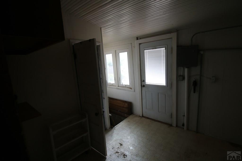 604 South Main Street Fowler, CO 81039 - Photo 22 of 38 a view of entryway and hall with a front door