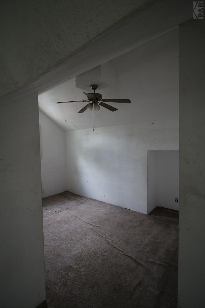 604 South Main Street Fowler, CO 81039 - Photo 28 of 38 an empty room with a ceiling fan and a window