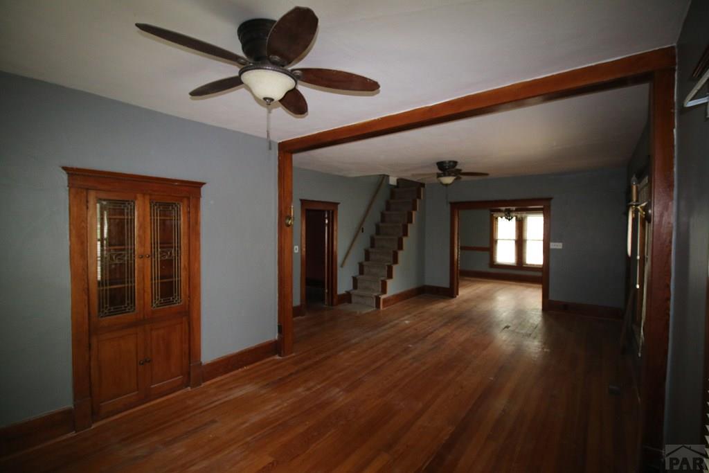 604 South Main Street Fowler, CO 81039 - Photo 3 of 38 a view of empty room with wooden floor