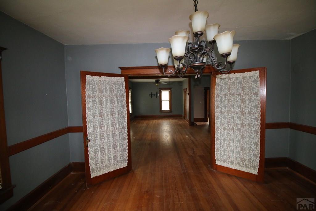 604 South Main Street Fowler, CO 81039 - Photo 6 of 38 a view of entryway with livingroom and wooden floor