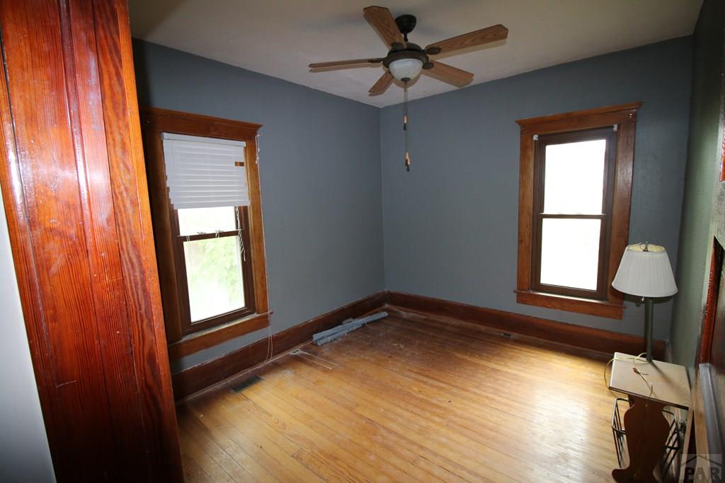 604 South Main Street Fowler, CO 81039 - Photo 9 of 38 a view of empty room with wooden floor and fan