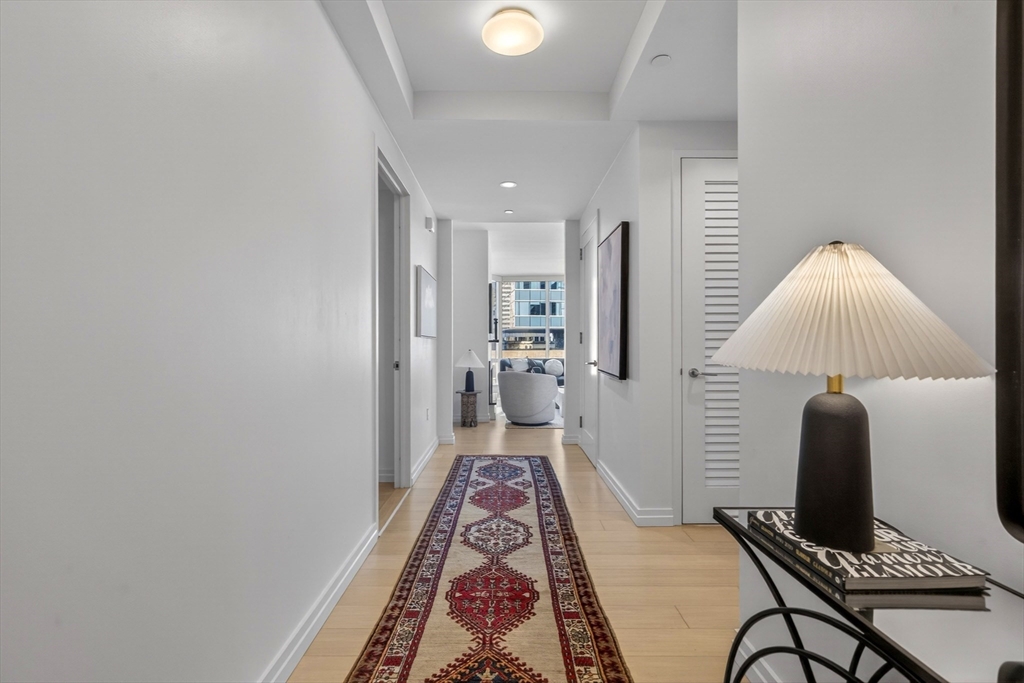 1 Franklin Street, Unit 1408 Boston, MA 02110 - Photo 26 of 37 a very nice looking room with a rug