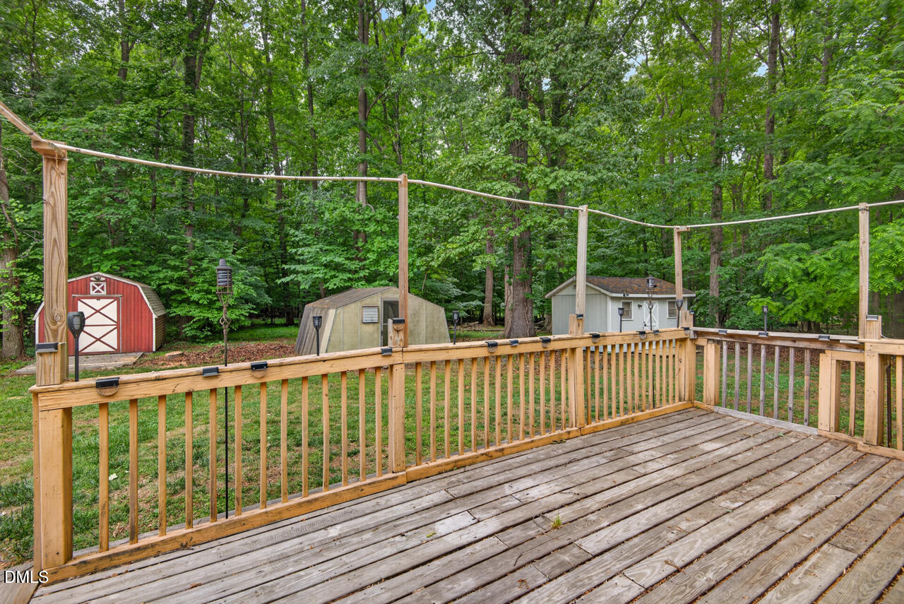 1420 Goodwin Road Durham, NC 27712 - Photo 17 of 54 a view of a balcony with wooden floor