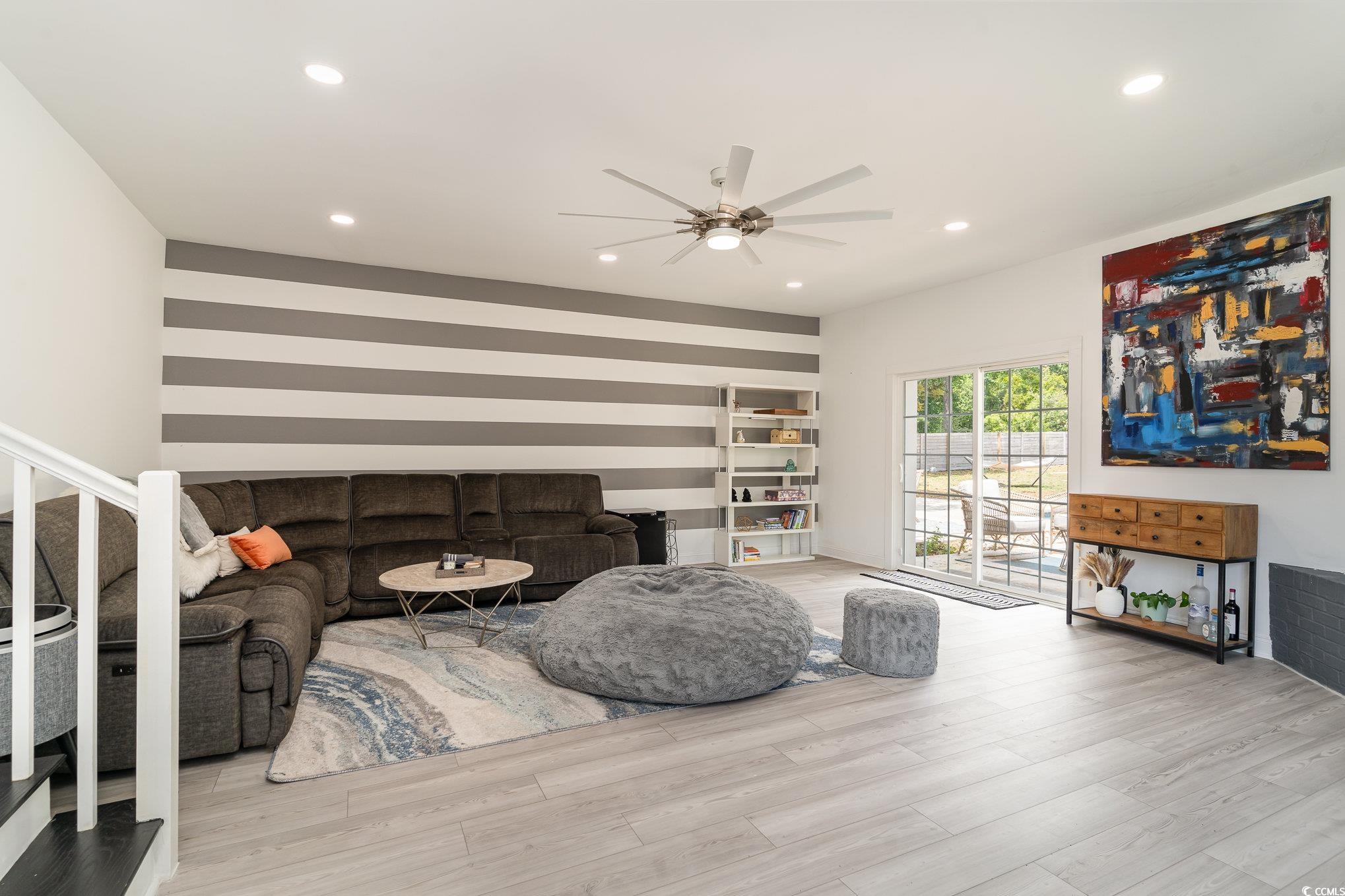5811 Sumter Drive Myrtle Beach, SC 29577 - Photo 13 of 39 Living area with recessed lighting, light wood finished floors, stairway, and a ceiling fan