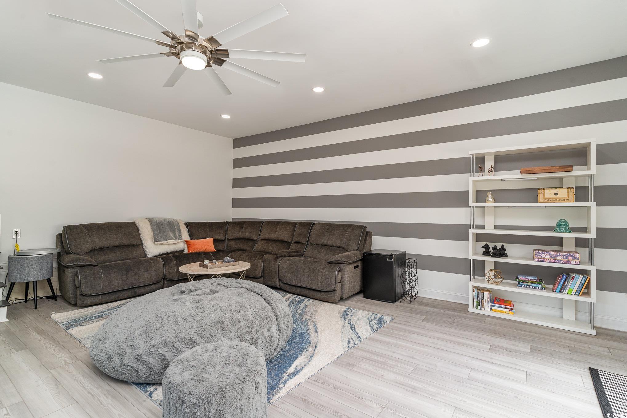 5811 Sumter Drive Myrtle Beach, SC 29577 - Photo 15 of 39 Living area with recessed lighting, light wood-style floors, and ceiling fan