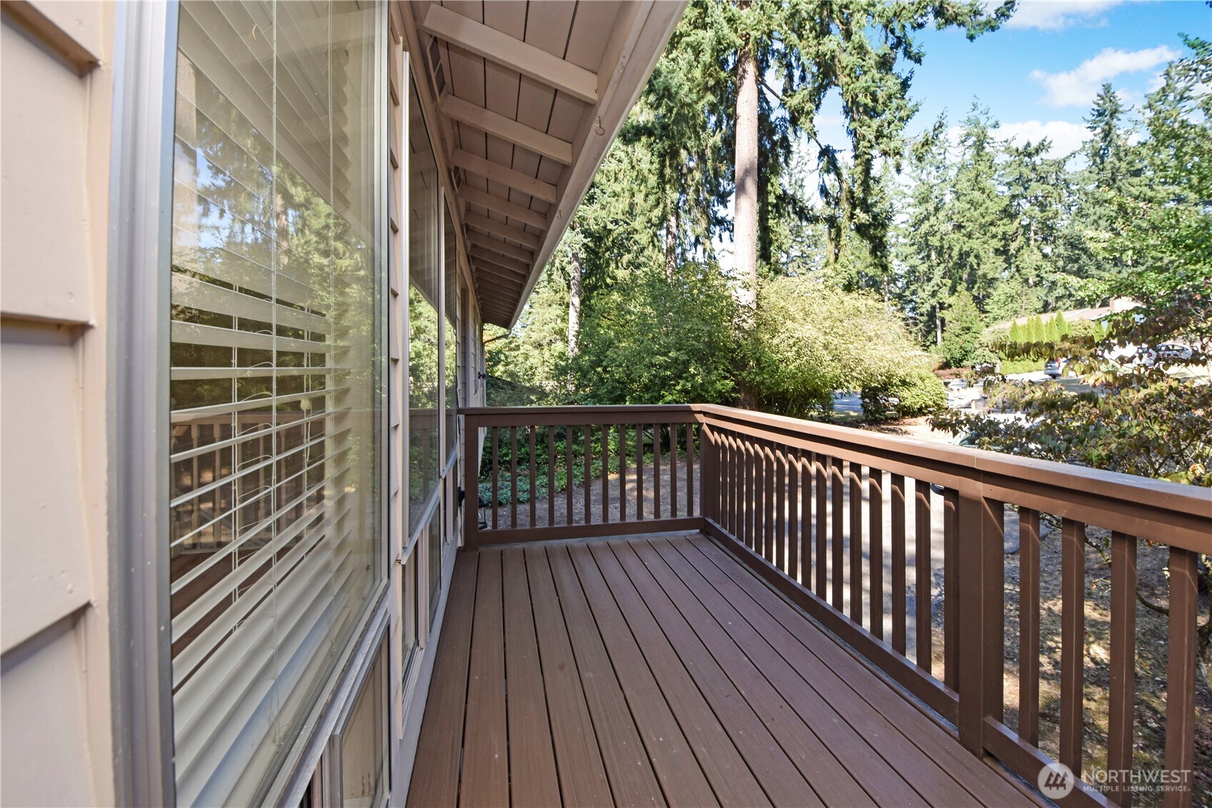 308 Point Fosdick Place Northwest Gig Harbor, WA 98335 - Photo 12 of 35 a view of a balcony with wooden floor