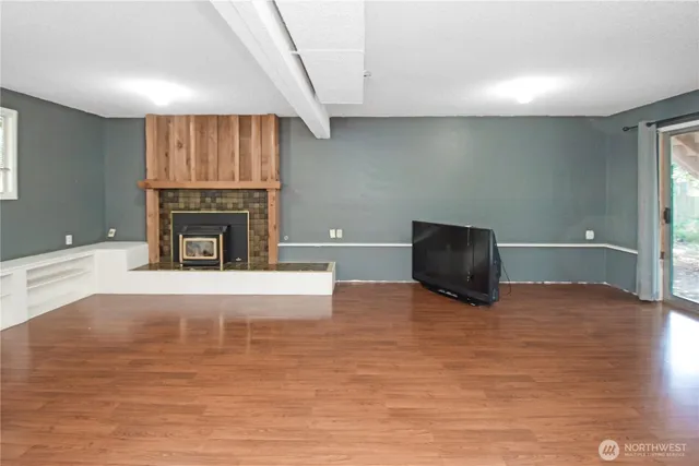 a view of livingroom with furniture and fireplace