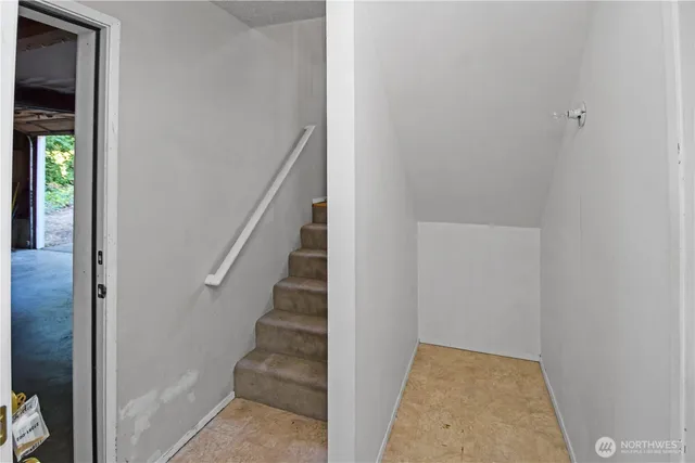 a view of a hallway with entryway