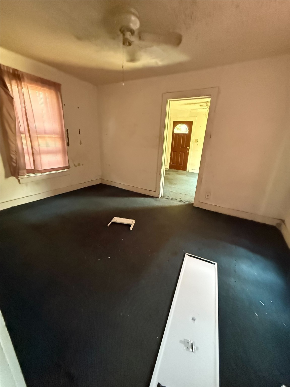6221 Peg Street Houston, TX 77092 - Photo 5 of 14 wooden floor in an empty room with a window