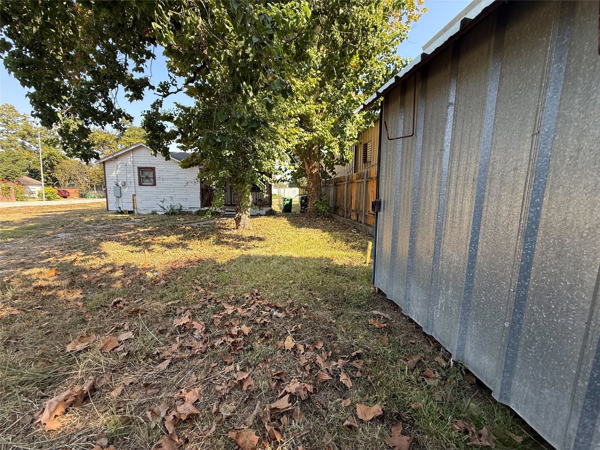 6221 Peg Street Houston, TX 77092 - Photo 8 of 14 a view of a house with a tree in the background