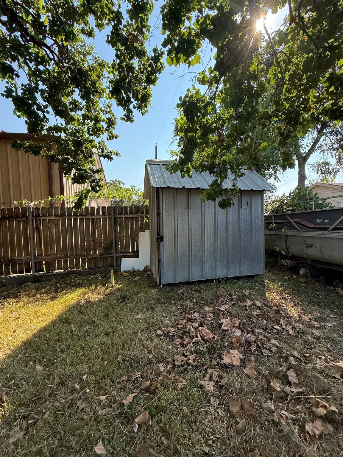 6221 Peg Street Houston, TX 77092 - Photo 9 of 14 a view of a backyard with wooden fence