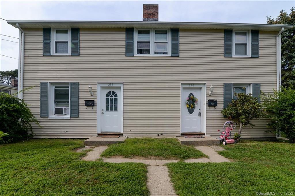 234 High Ridge Drive Bridgeport, CT 06606 - Photo 1 of 1 a front view of a house with a yard