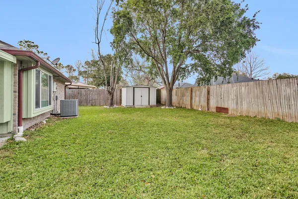 a house view with a garden space