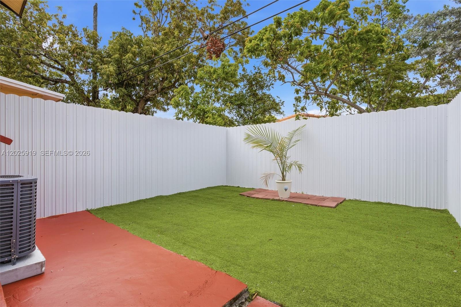 1743 Southwest 17th Street, Unit 1 Miami, FL 33145 - Photo 23 of 32 a backyard of a house with lots of green space
