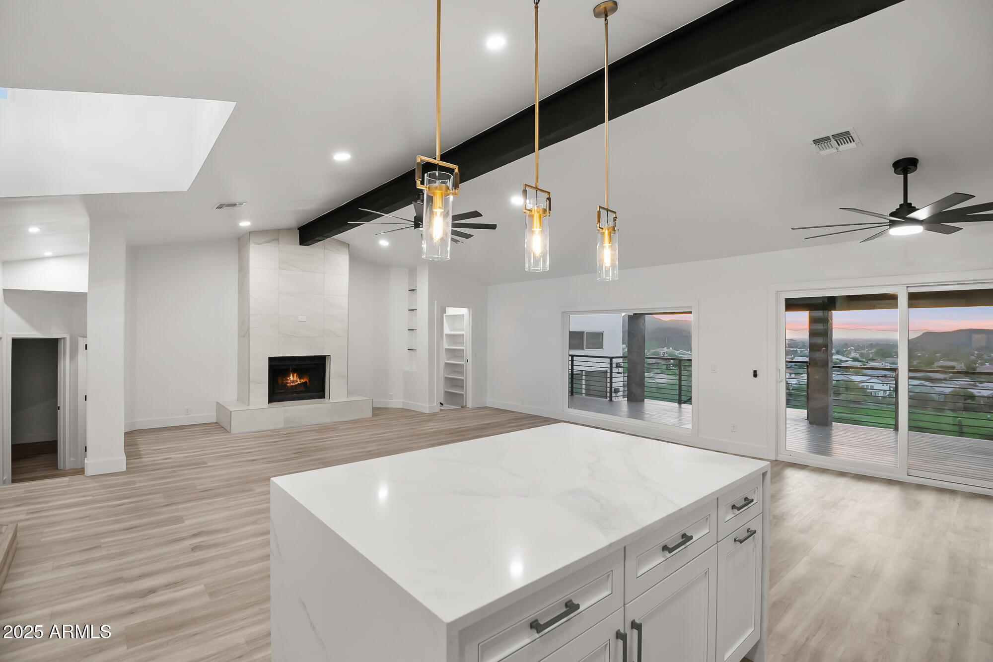 13428 North 16th Place Phoenix, AZ 85022 - Photo 9 of 29 a large white kitchen with a large window