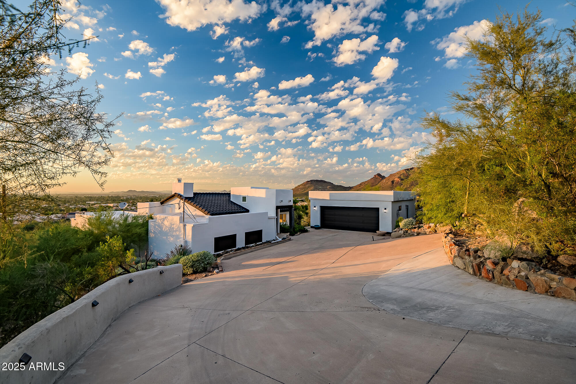 13428 North 16th Place Phoenix, AZ 85022 - Photo 2 of 29 a front view of a house with a yard and garage