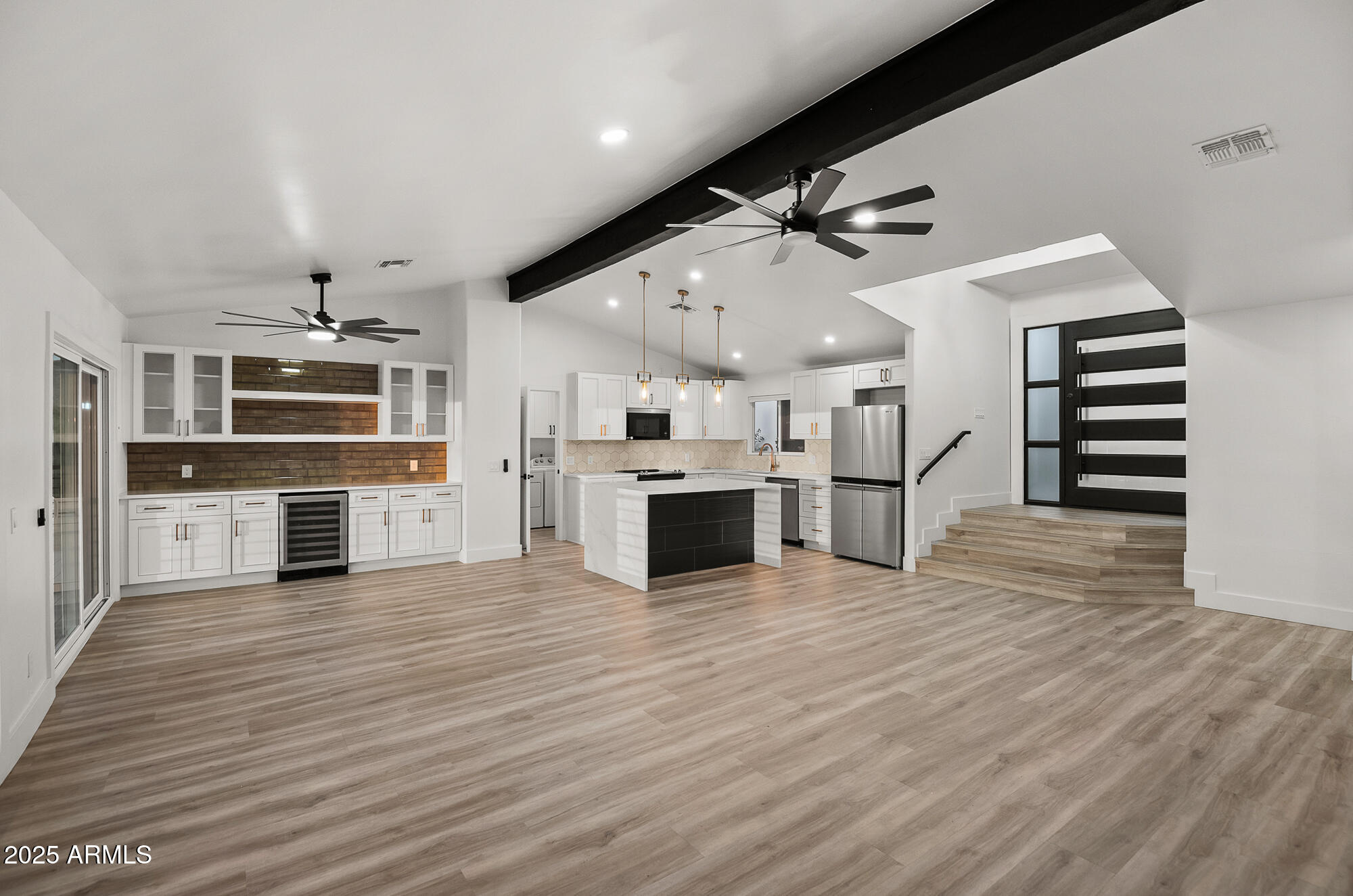 13428 North 16th Place Phoenix, AZ 85022 - Photo 4 of 29 a view of a kitchen with a sink cabinets and stainless steel appliances